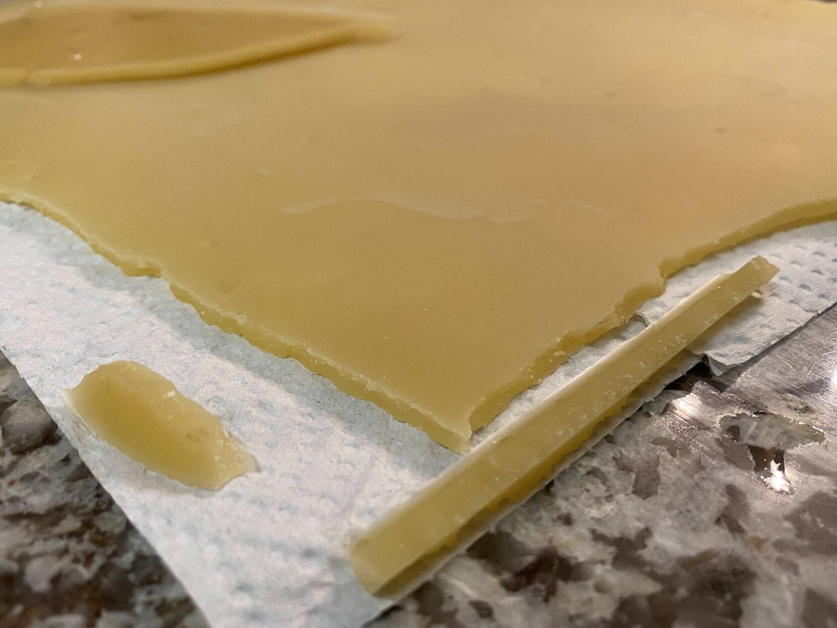 Rendered beeswax on paper towel